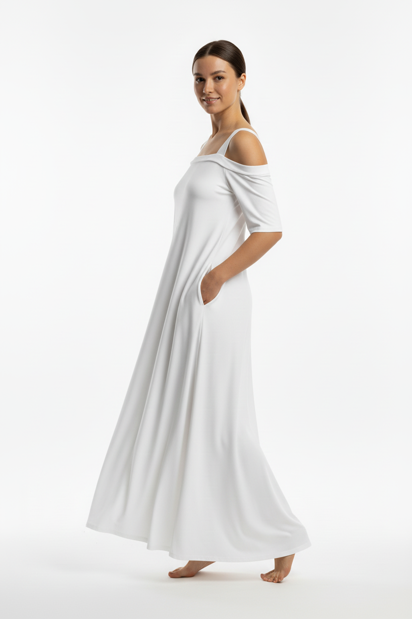 Modelo con vestido blanco de perfil